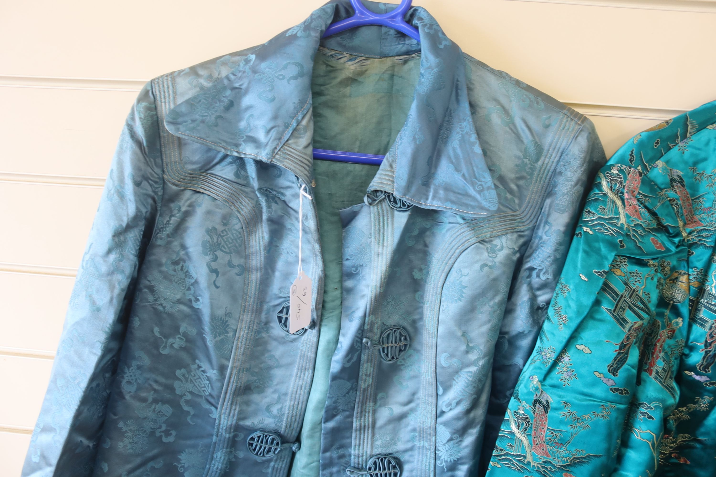 A Chinese turquoise silk damask Chinese robe / jacket, length 67cm, and a later 1940's coloured brocade jacket